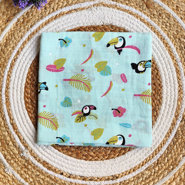 Muslin Colored Swaddle – Green Toucan Print